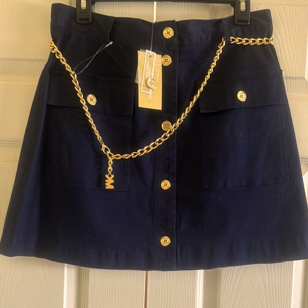 NWT Michael Kors Midnight Blue Denim Skirt with Gold Chain and Buttons. Size 10.